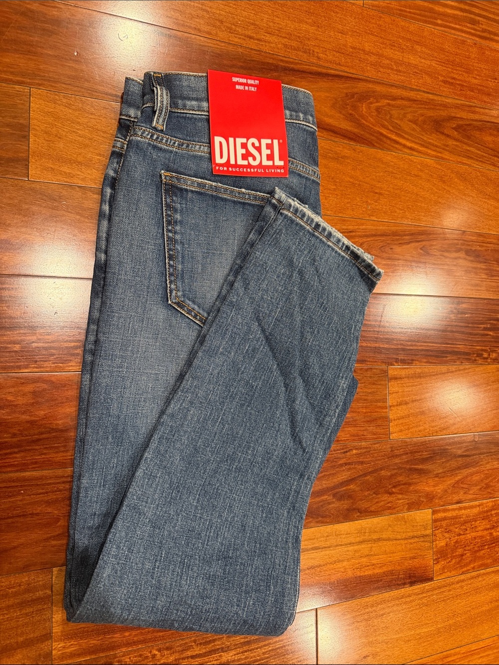Diesel Slim Jeans in Indigo Blue with Red Logo Tag